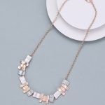 Rose gold coloured necklace